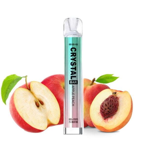 Crystal disposable ecigarette on the apples and peaches. Everything on a white background.
