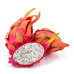 Two and a half dragon fruits in the white background.