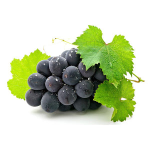 Black grapes and green leaves in the white background.